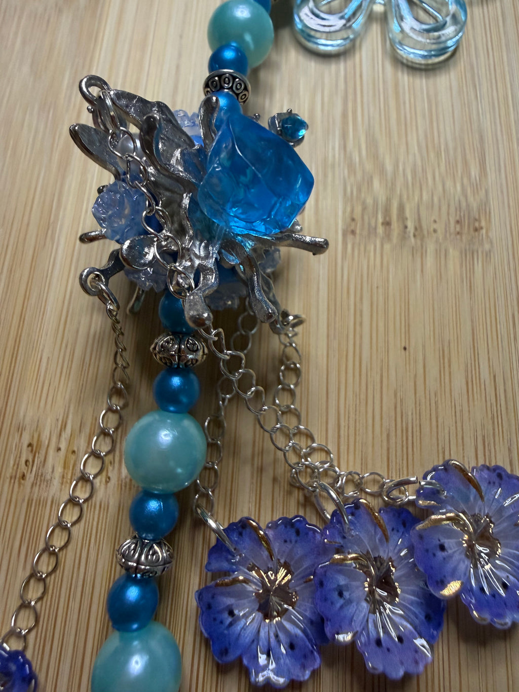 💙 Bijou de téléphone « Fleur Bleu Océan »