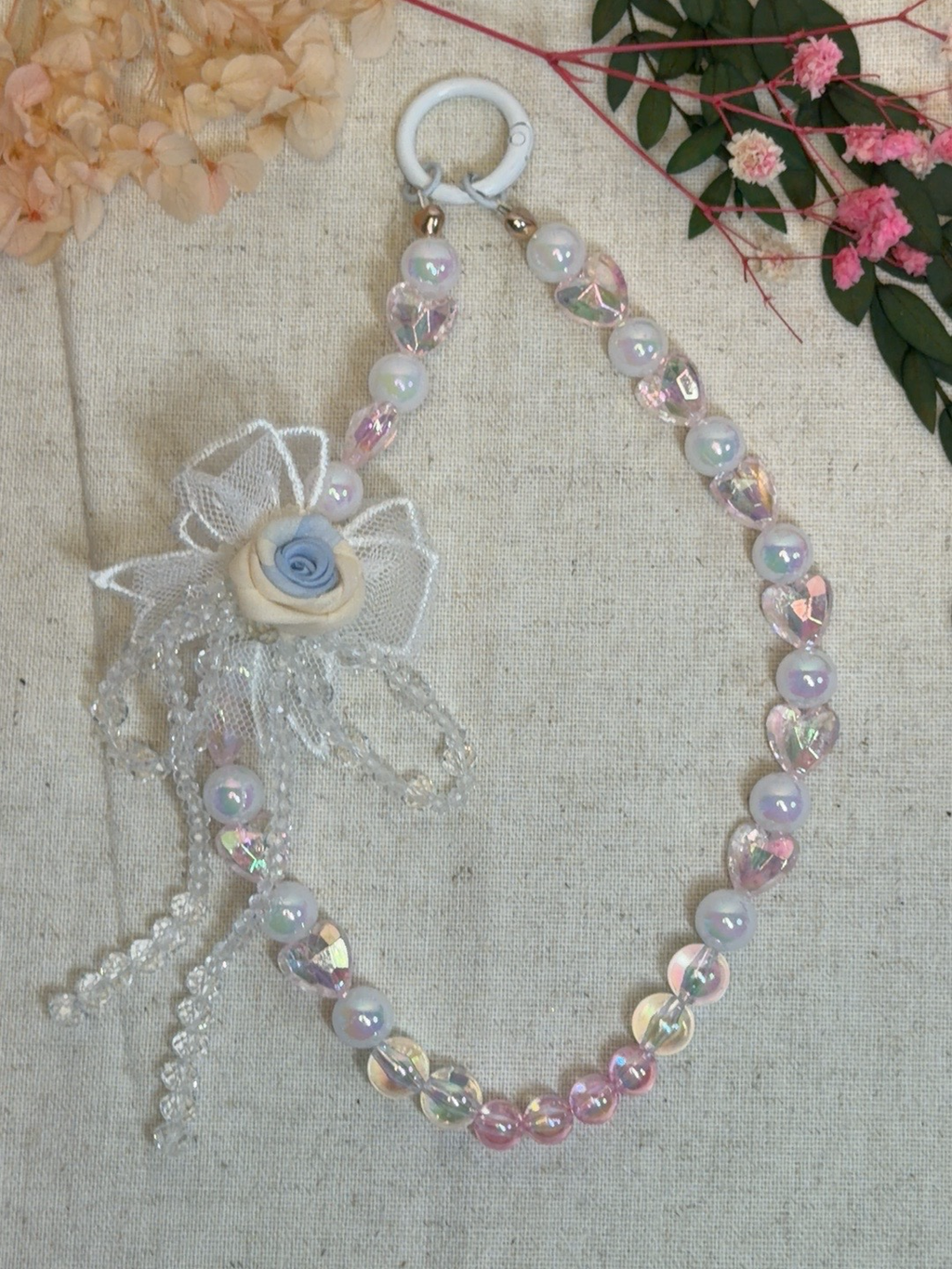 Bijou de téléphone – Rose Bleue Élégance