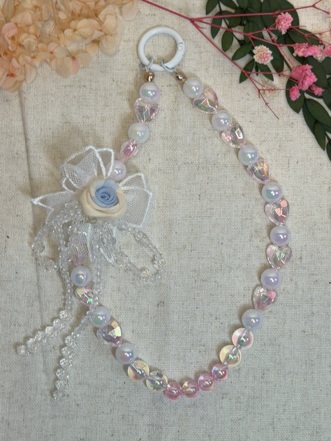 Bijou de téléphone – Rose Bleue Élégance
