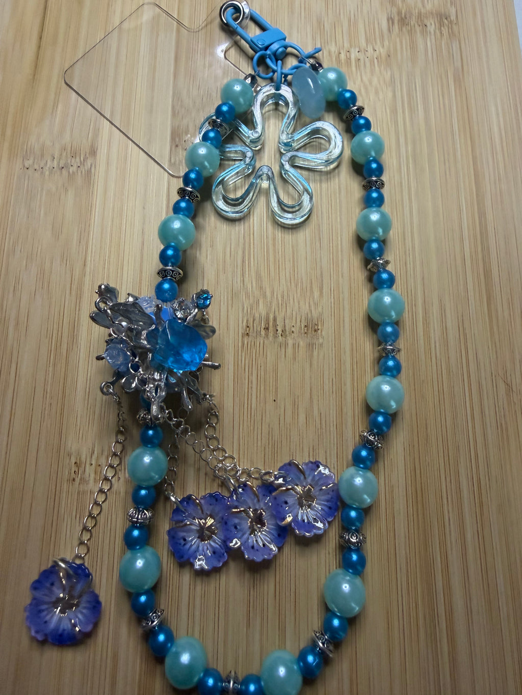 💙 Bijou de téléphone « Fleur Bleu Océan »