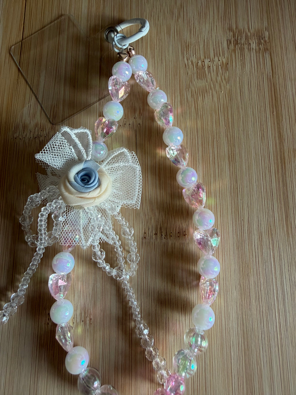 Bijou de téléphone – Rose Bleue Élégance