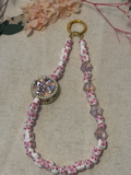 🌸 Bijou de téléphone – Perles céramiques fleuries