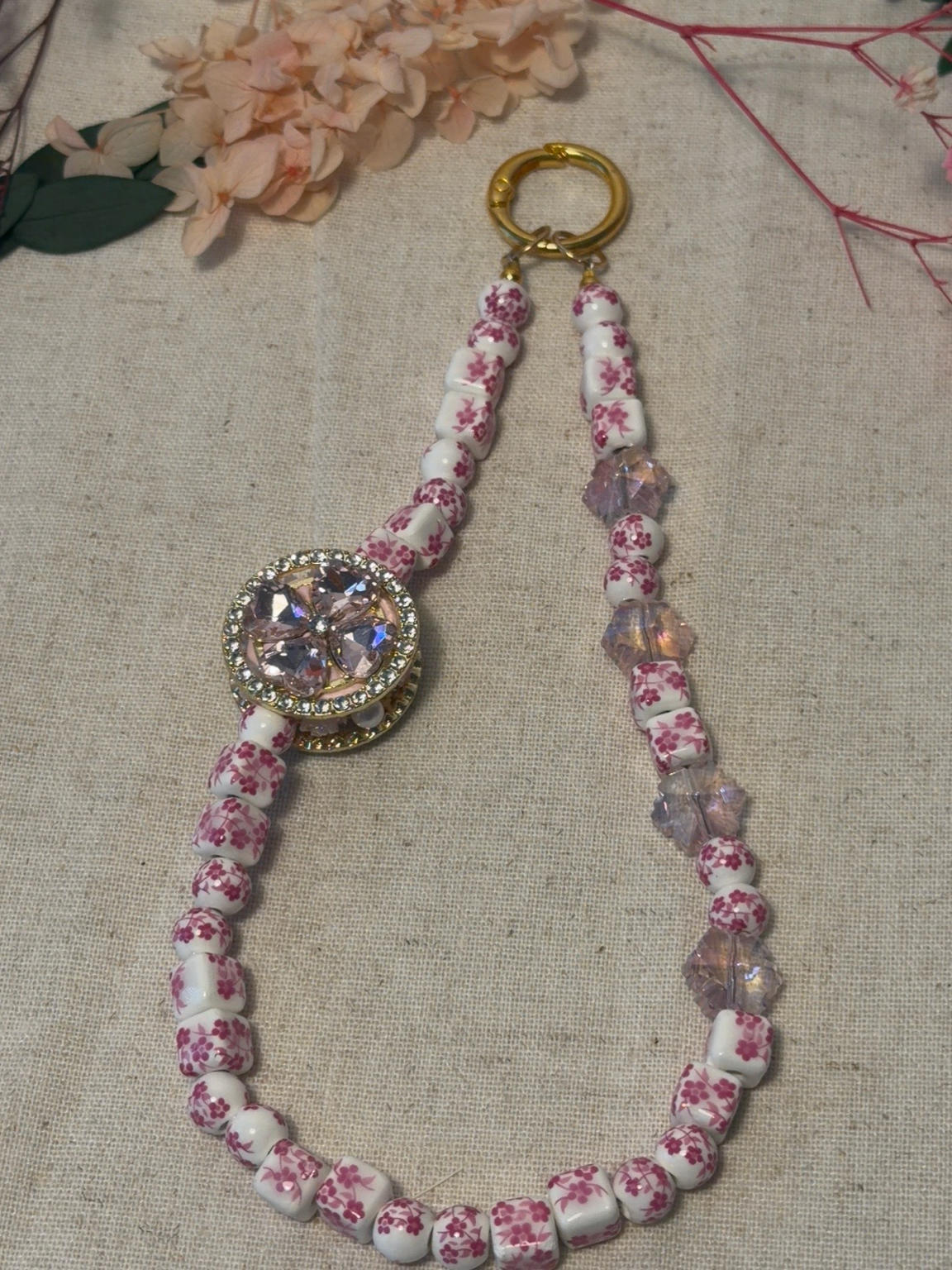 🌸 Bijou de téléphone – Perles céramiques fleuries